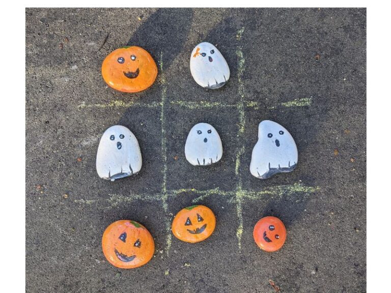 Halloween-themed Painted Rocks used for Tic-Tac-Toe