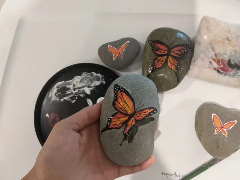 Butterflies painted on rocks.
