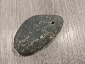 A rock with holes and gaps.