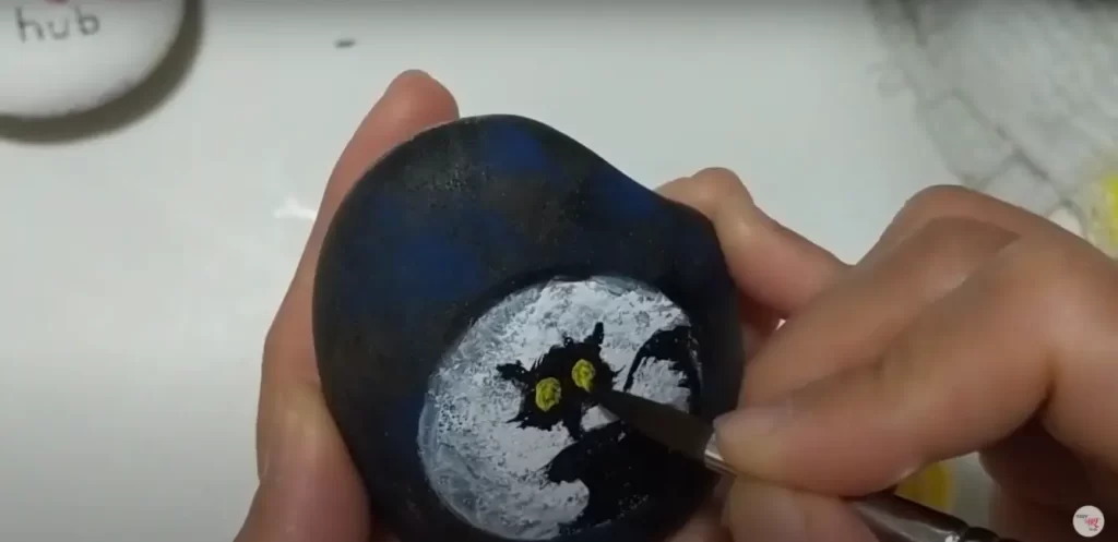 Step 7: Yellow Eye(Spooked Cat Halloween Rock Painting)