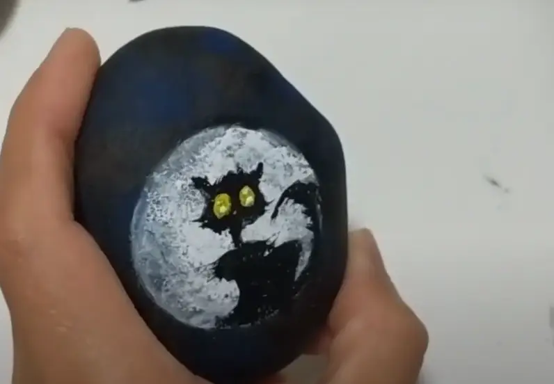 Step 7b: White Eye Dot(Spooked Cat Halloween Rock Painting)