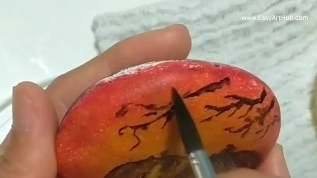 Step 3. Add Branches (Halloween Pumpkin Rock Painting Tutorial)