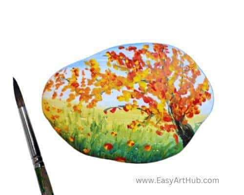 Autumn Anew: Acrylic Painting on a Rock