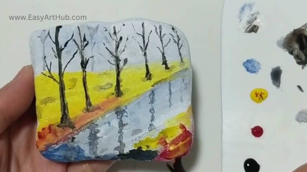 Step 6.Colorful Leaves (Serene Autumn Rock Painting Tutorial)